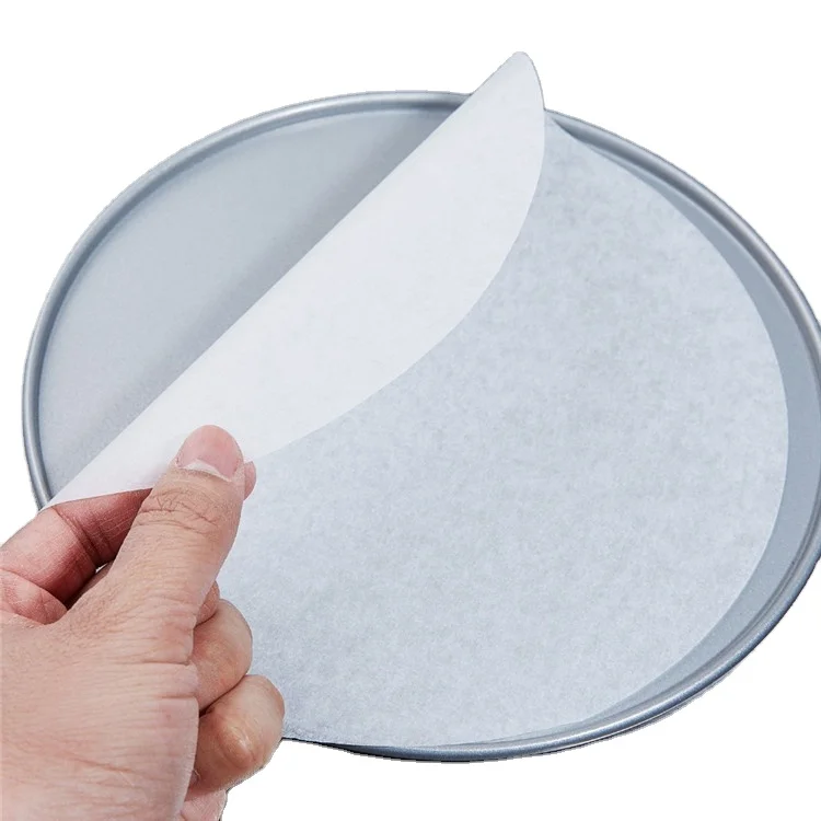 Thick white parchment paper squares and standard round nonstick parchment baking paper greaseproof food paper