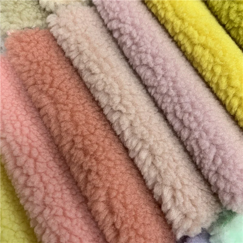 Free sample Hot sale 100% polyester red check jacquard wool rainbow color flannel fleece wholesale fabrics