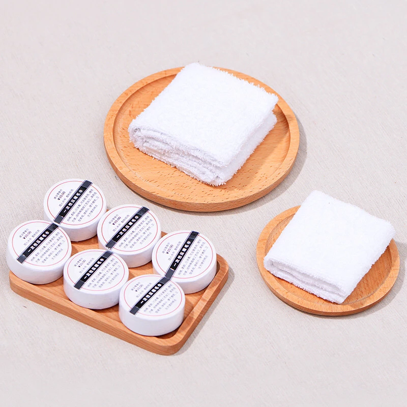 Wholesale Chinese factory compressed disposable hotel travel small towel