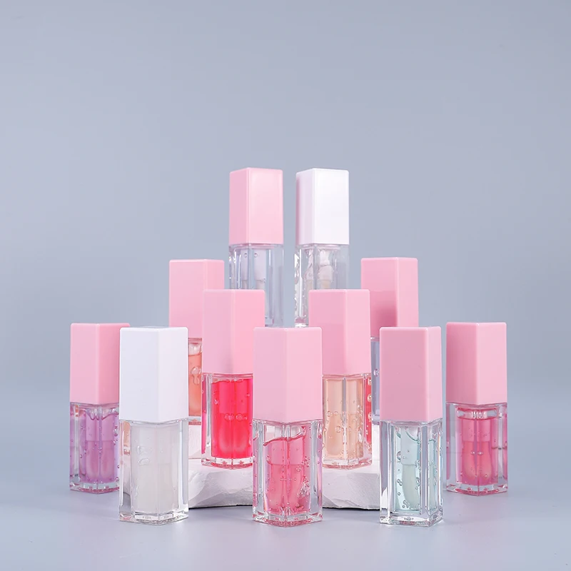 Wholesale Low MOQ high quality glossy organic fruit flavor lip oil private label clear vegan pink lip oil