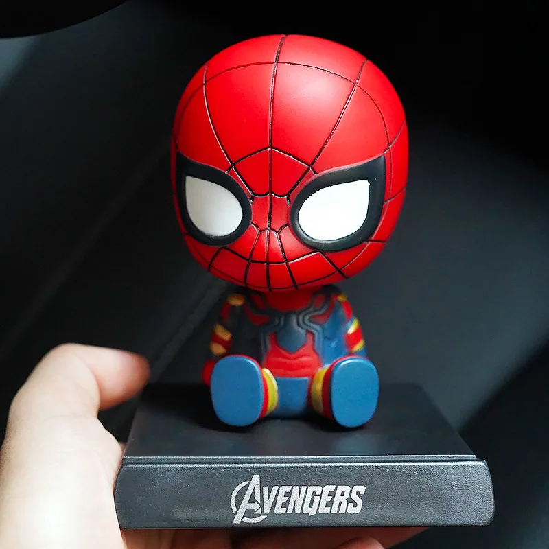 Игрушечные фигурки с качающейся головой