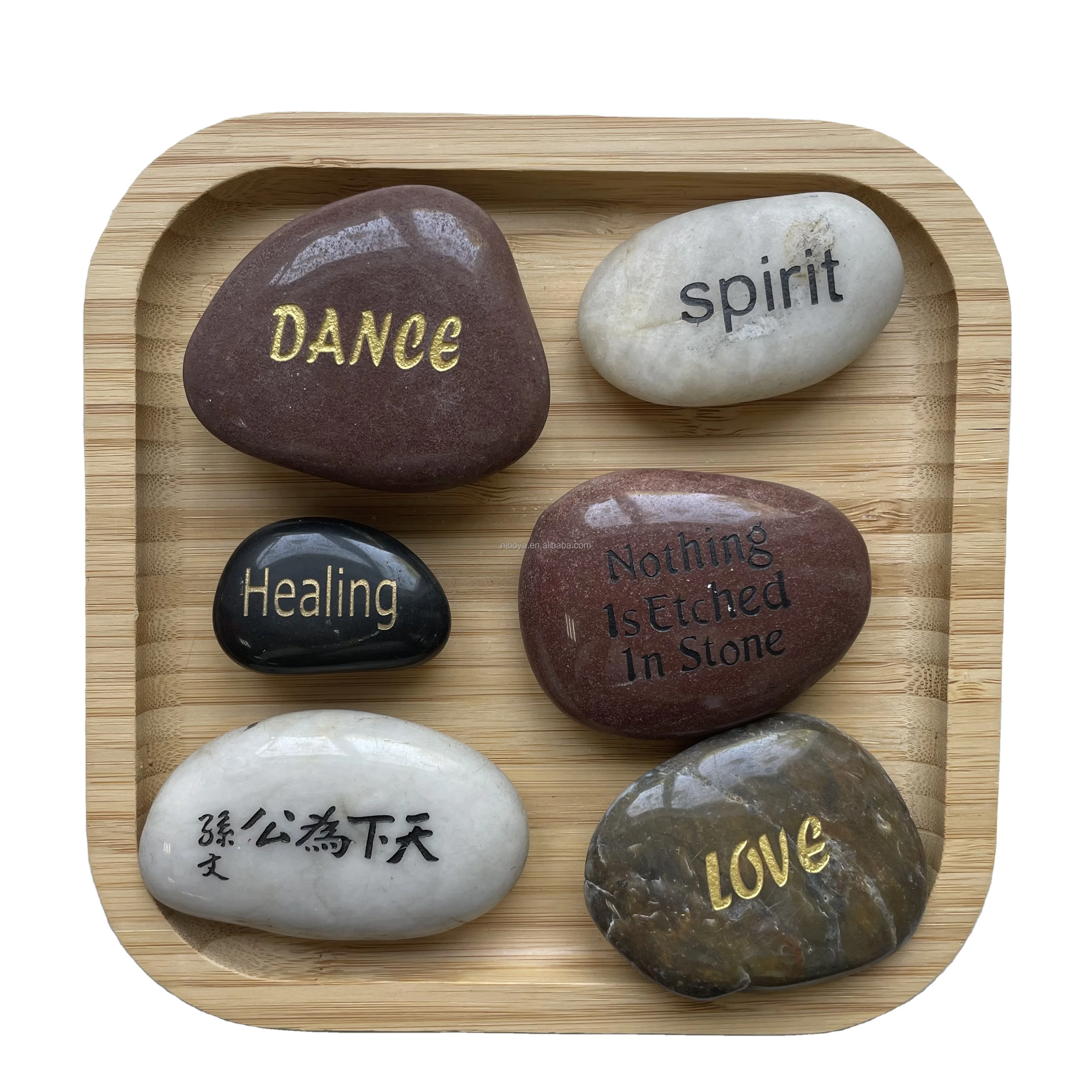 Engraved letter pebbles for gift store