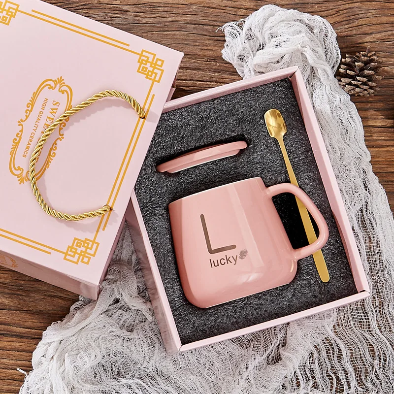 Exquisite creative promotion ceramic mug with spoon festive gift/All kinds of holiday gifts