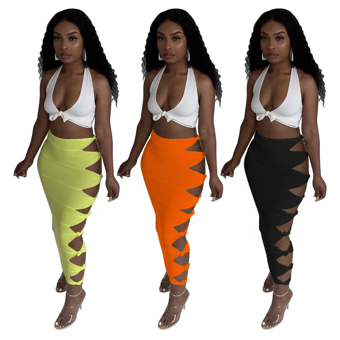 Street sexy solid color knotted and ripped stitching female long skirt