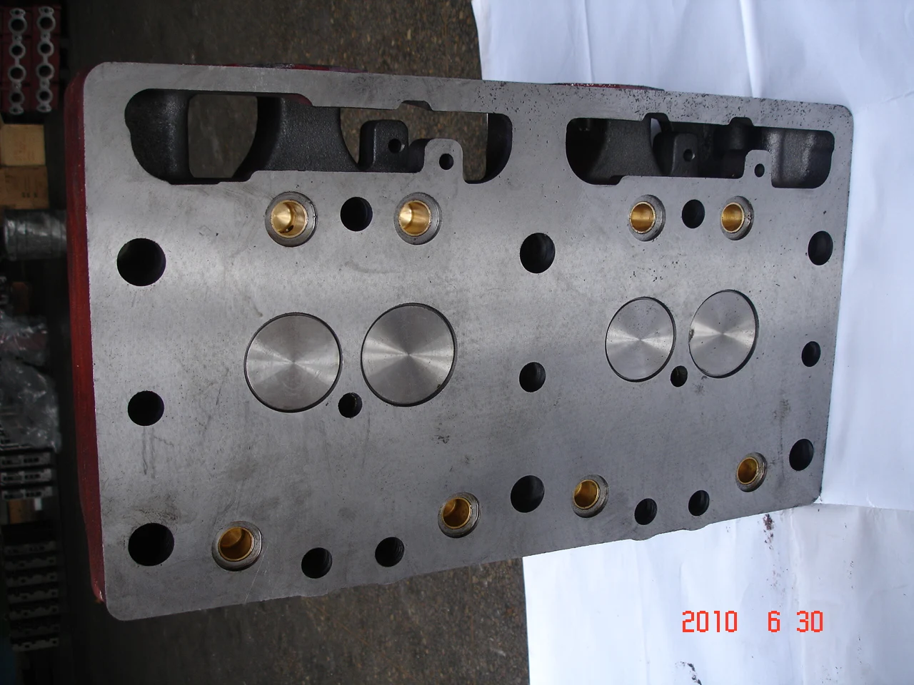 T-130 в сборе головки блока цилиндров