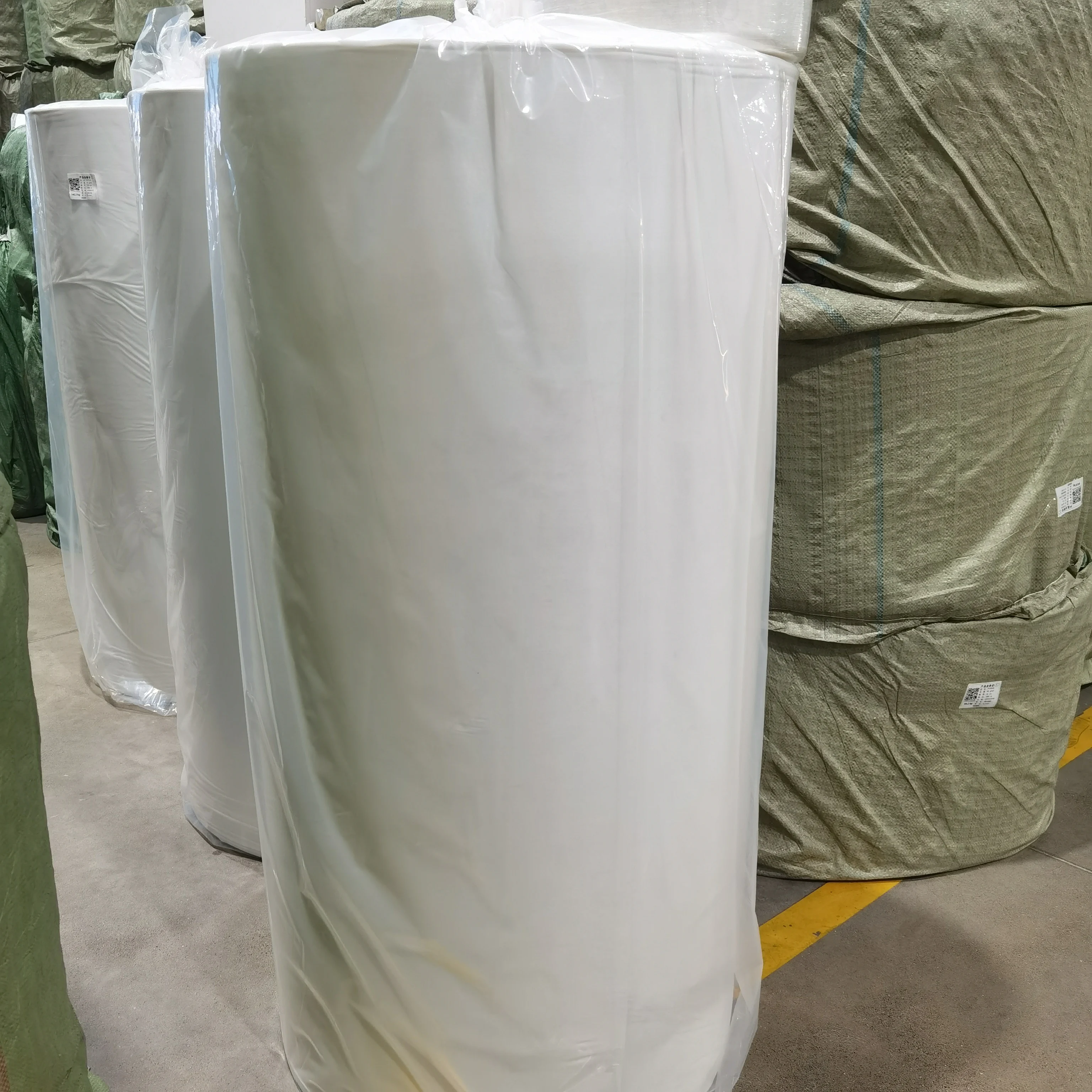 100% Viscose Rayon  Non Woven Fabric Embossed Pattern White Color Airlaid Paper Spunlace Nonwoven Manufacturer