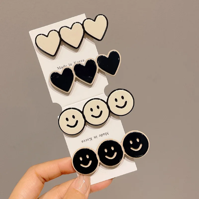 Оптовая продажа 2023 горячий дизайн ацетатные белые черные улыбающиеся сердца для девочек челки украшение утка бис зажим