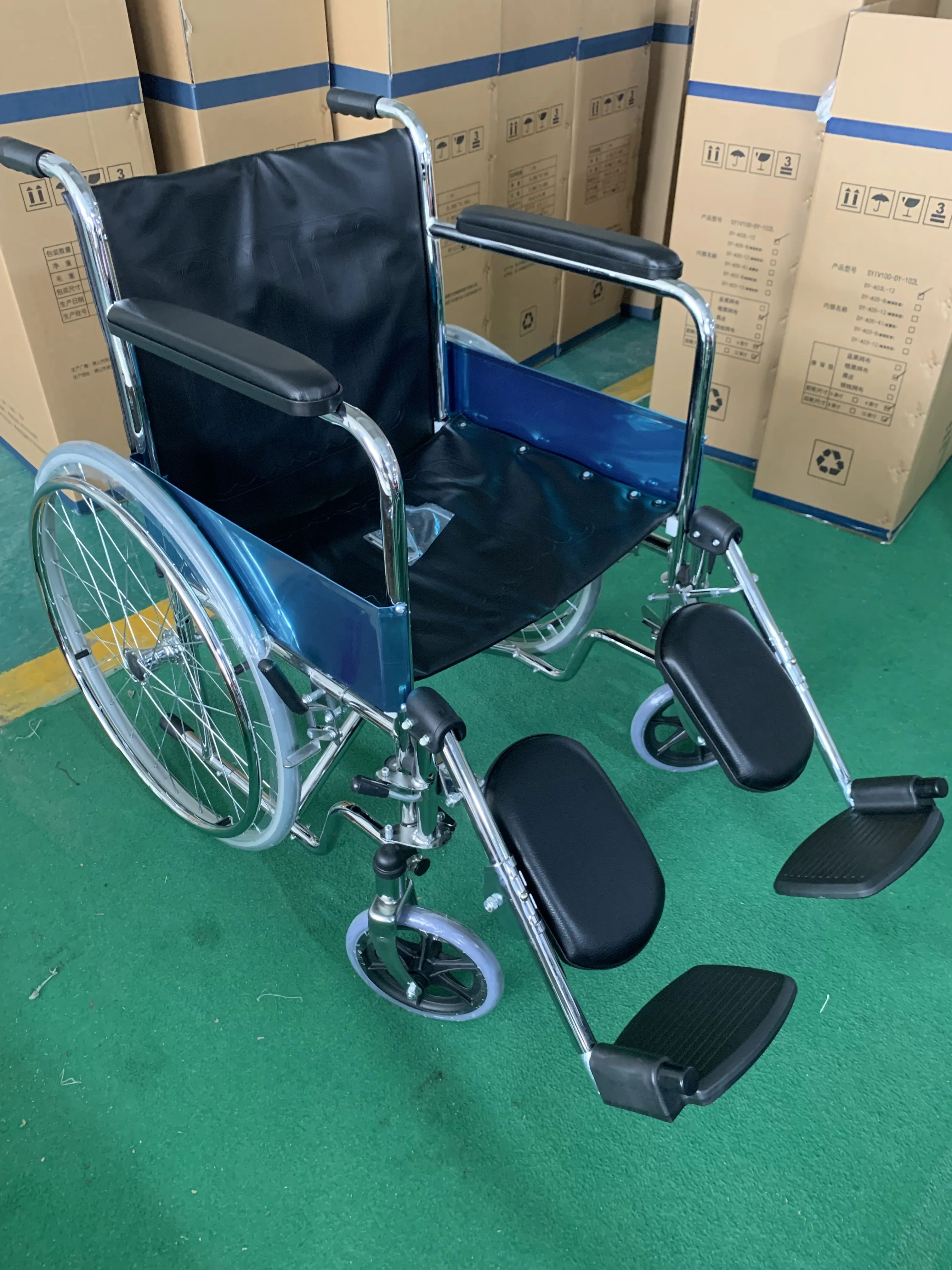 Cheap price comfortable economic manual wheelchair with elevating leg rest