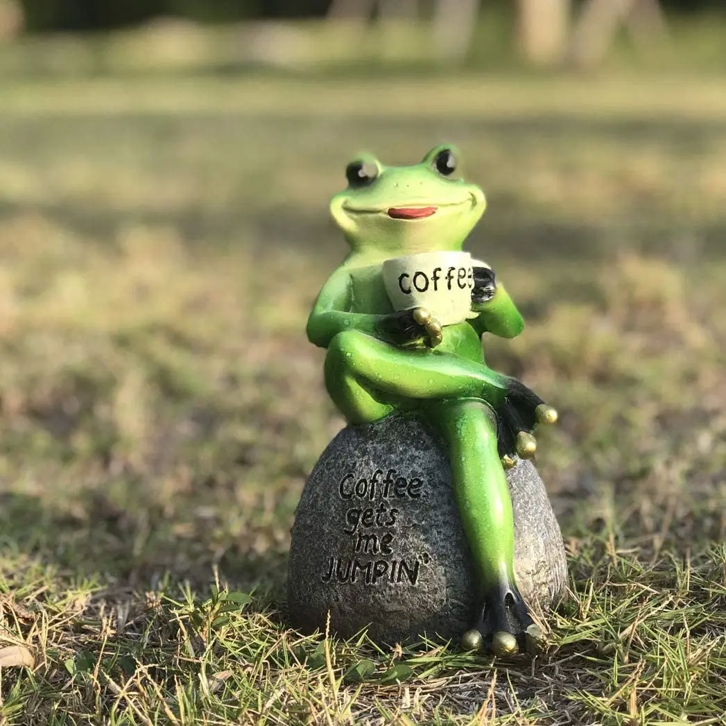 Creative Green Frog Sitting on Stone Statue Drinking Coffee