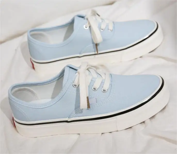 Wholesale custom fashionable low top lace up canvas shoes breathable mesh street walking sneakers