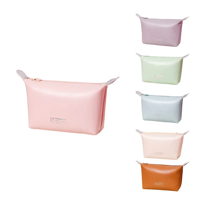 New fashion Candy-colored dumpling bag waterproof PU cosmetic bag convenient hand storage bag .