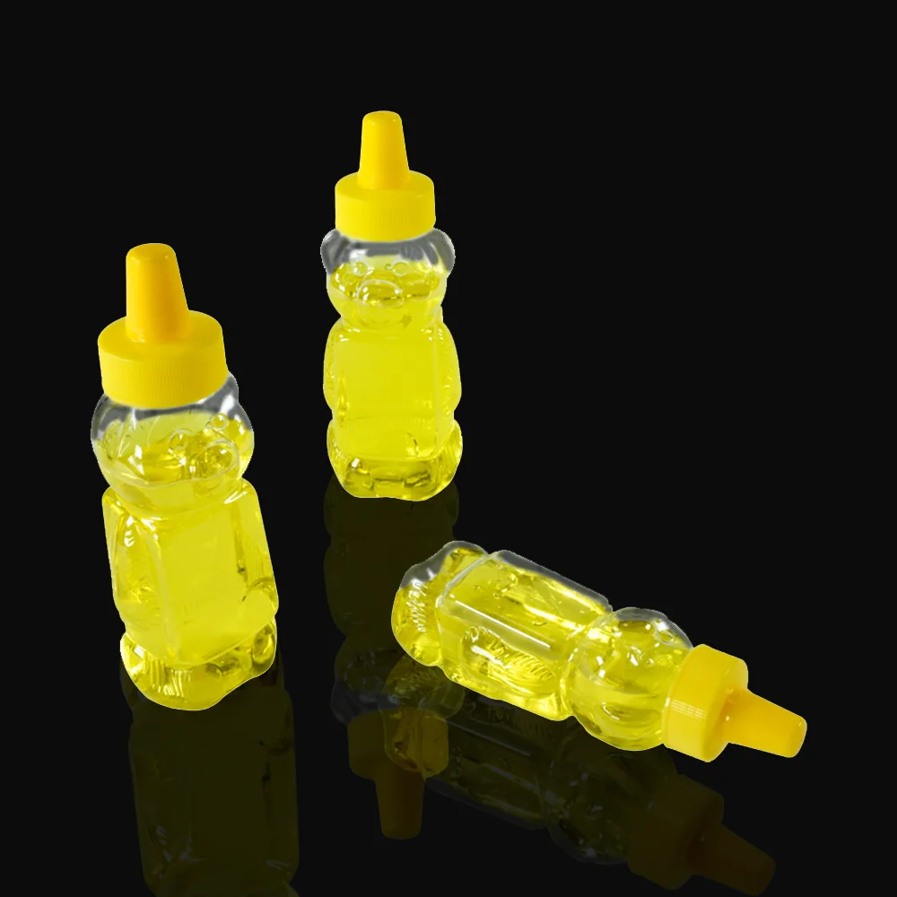Unique animal bear shape squeeze plastic honey bottle pet material honey jars for sauce plastic container