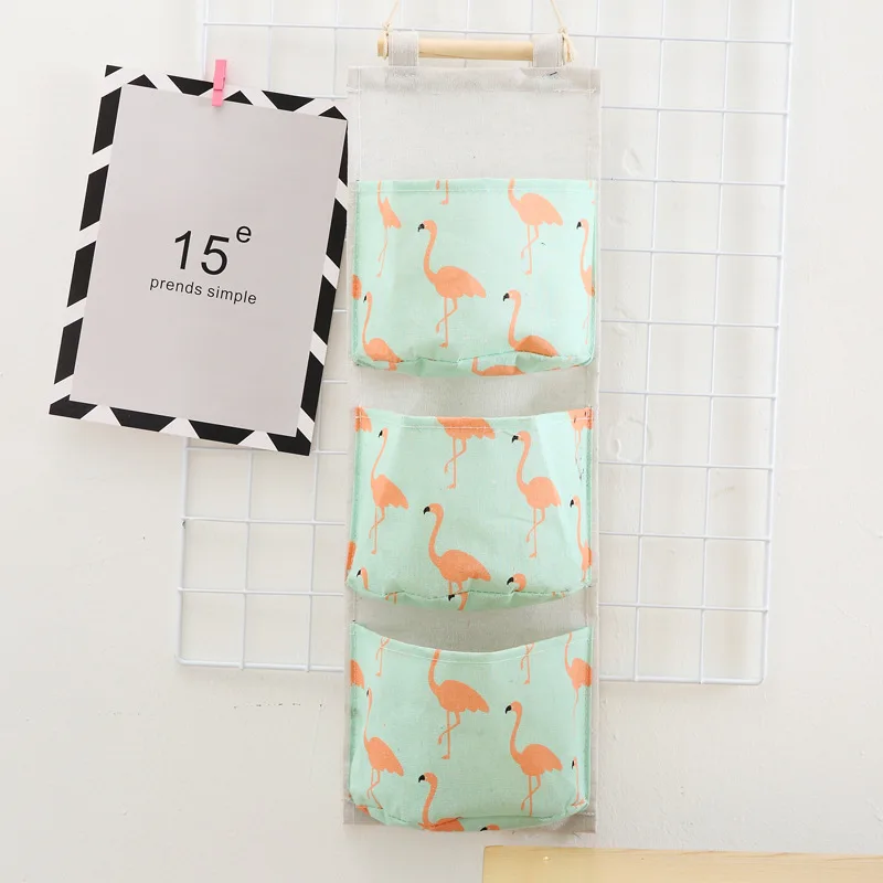 Hot selling new three pocket large dormitory wall mobile phone hanging storage student bedroom storage bag