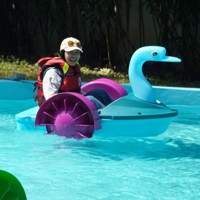 Customized shape swan frog durable HDPE with light mini kids paddle boat for sale