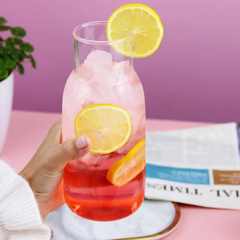 Kitchen Glass Storage jar with cork lid glass water bottle manufacture OEM  jars with unique feeder shape for honey