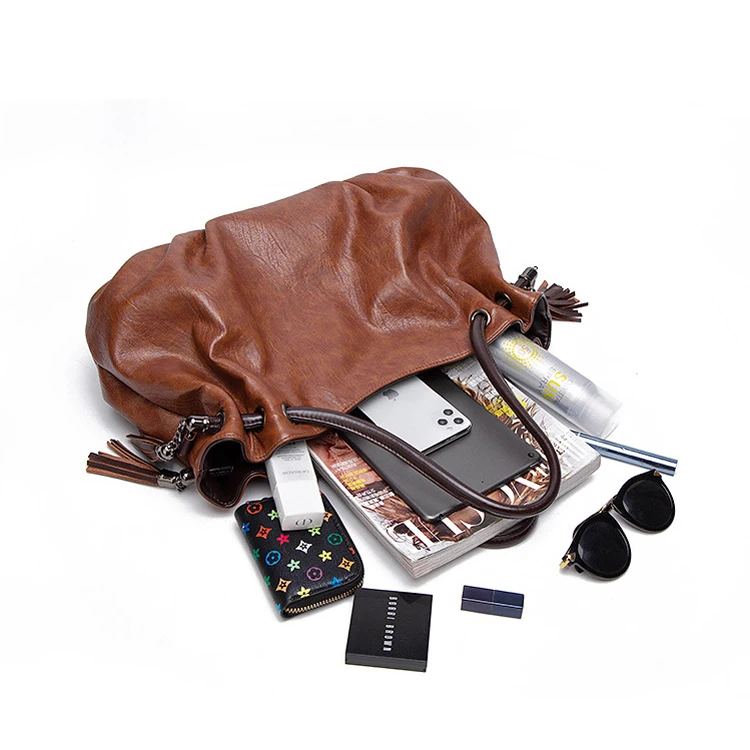 Trendy designer guangzhou retro ladies purses and handbags elegant Black women soft leather cheap handbag bags with tassel