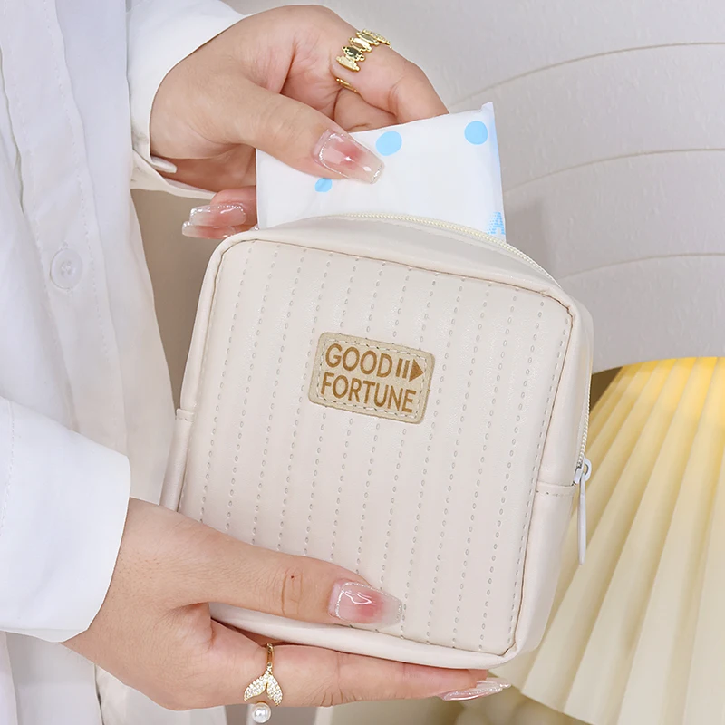 Large capacity portable cream aunt towel storage bag, monthly hygiene cotton storage bag, zero wallet, female lipstick storage b