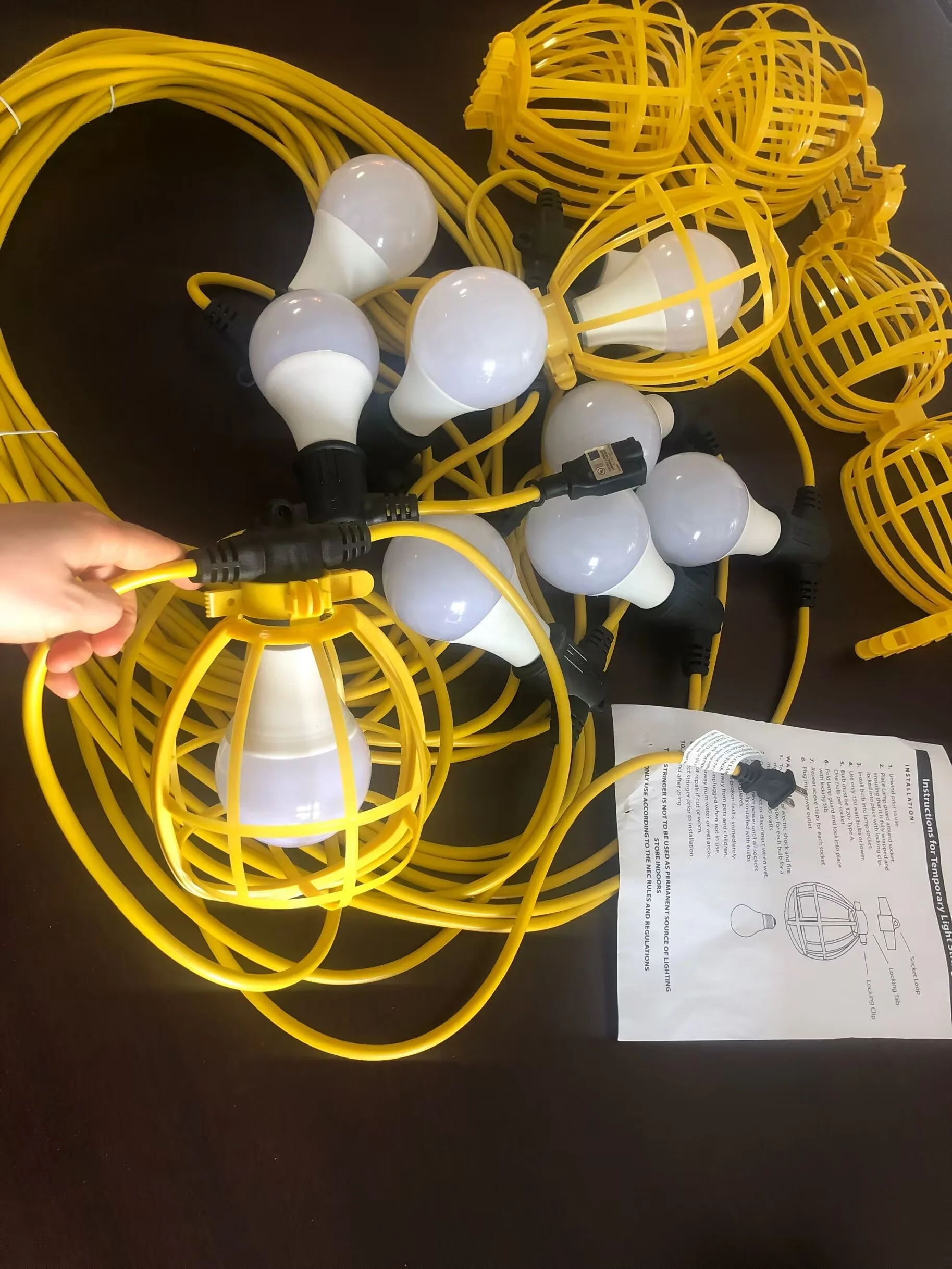hot sale waterproof temporary work string light 2 cores string lights yellow plastic cage temporary light