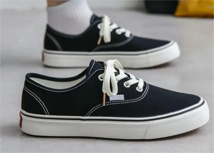 Wholesale custom fashionable low top lace up canvas shoes breathable mesh street walking sneakers