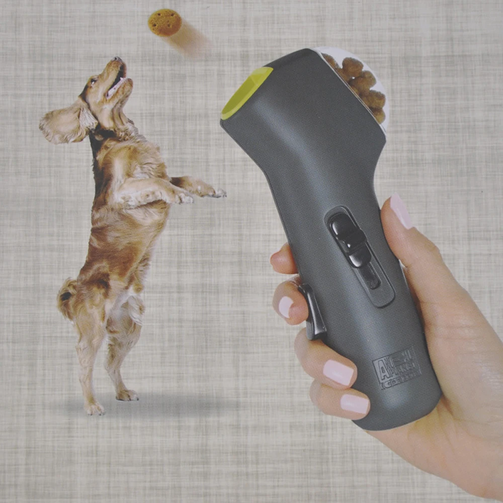 New design smart interactive dog food launcher dog training launcher handheld interactive dog snack launcher