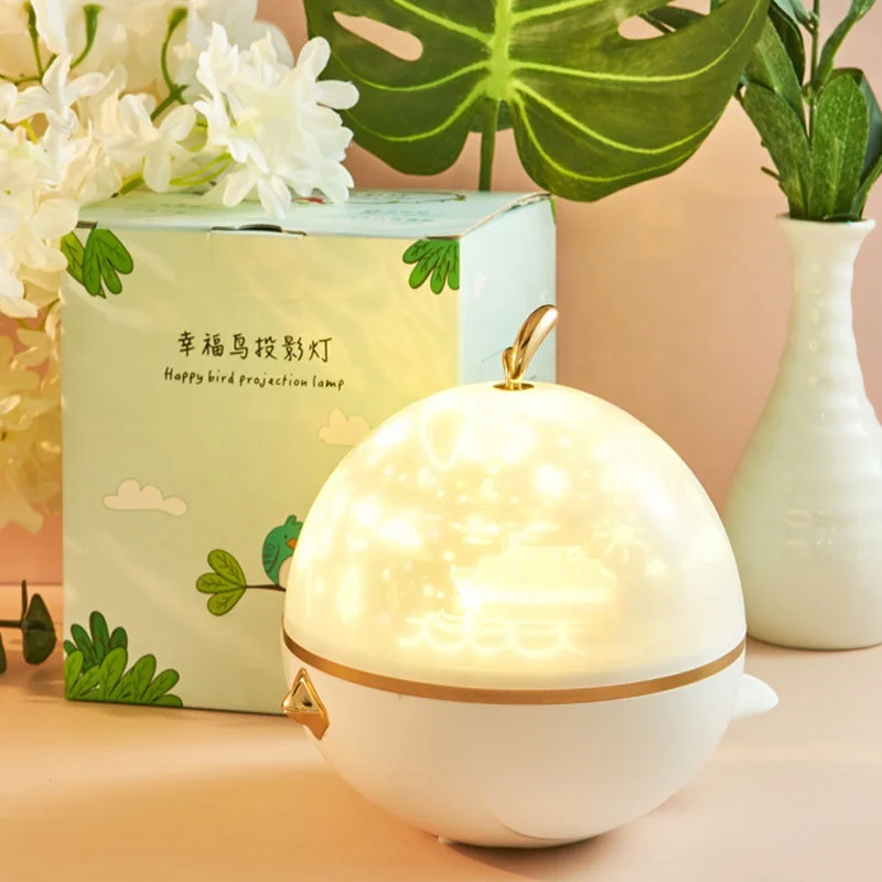 New Design Happy Bird Star Mini Night Light Projector 360 Degree Rotating Music Light