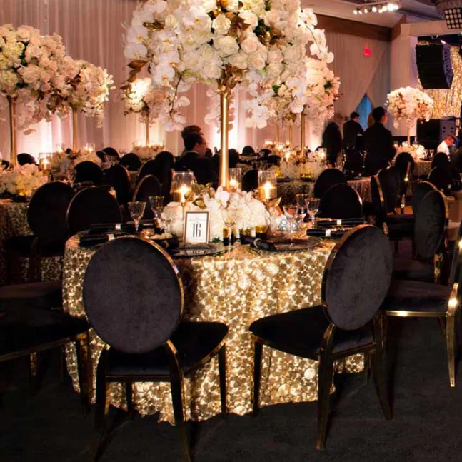 Оптовая продажа, штабелируемые прочные стулья из нержавеющей стали золотистого и черного цвета с круглой спинкой для банкетов, торжеств, свадеб