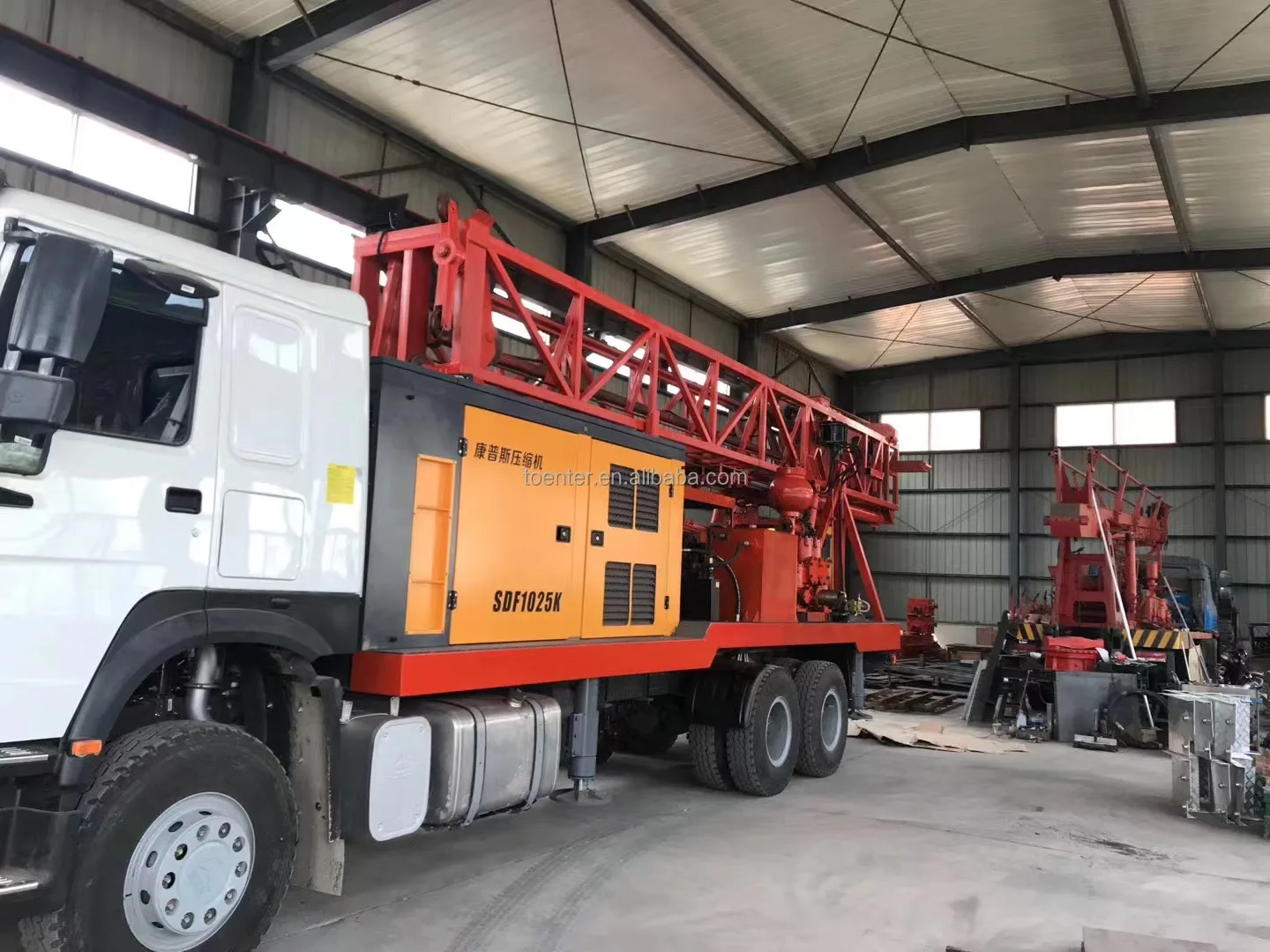 Vehicle-mounted large down-the-hole drilling rig and air compressor integrated car drill