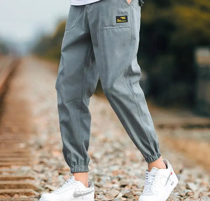 
2020 Autumn/winter plus fleecy pants for men loose-fitting sport long pants with thickening and large size corset overalls for m 