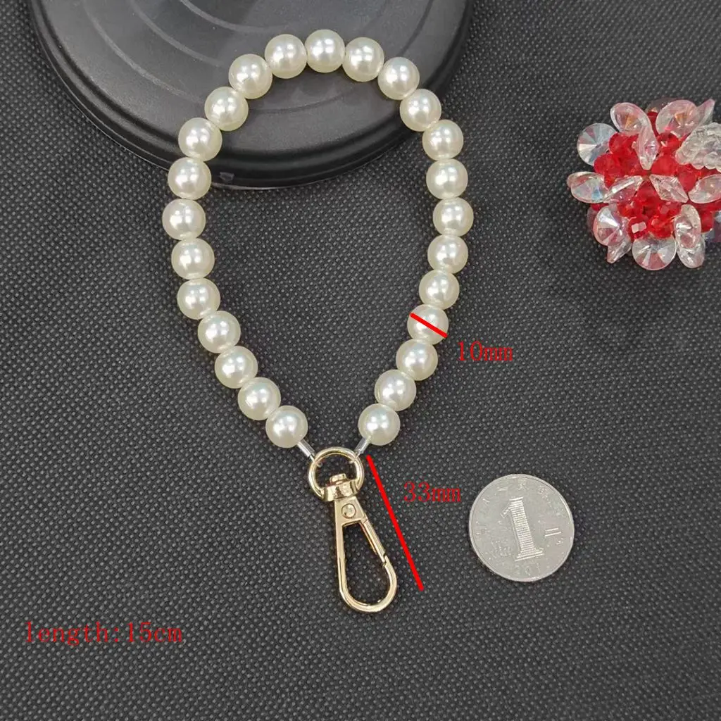 Factory wholesale Pearl Keychain Creative Small Gift Pearl Key Ring With Steel Wire Beading Pendant Key For Bag Accessories