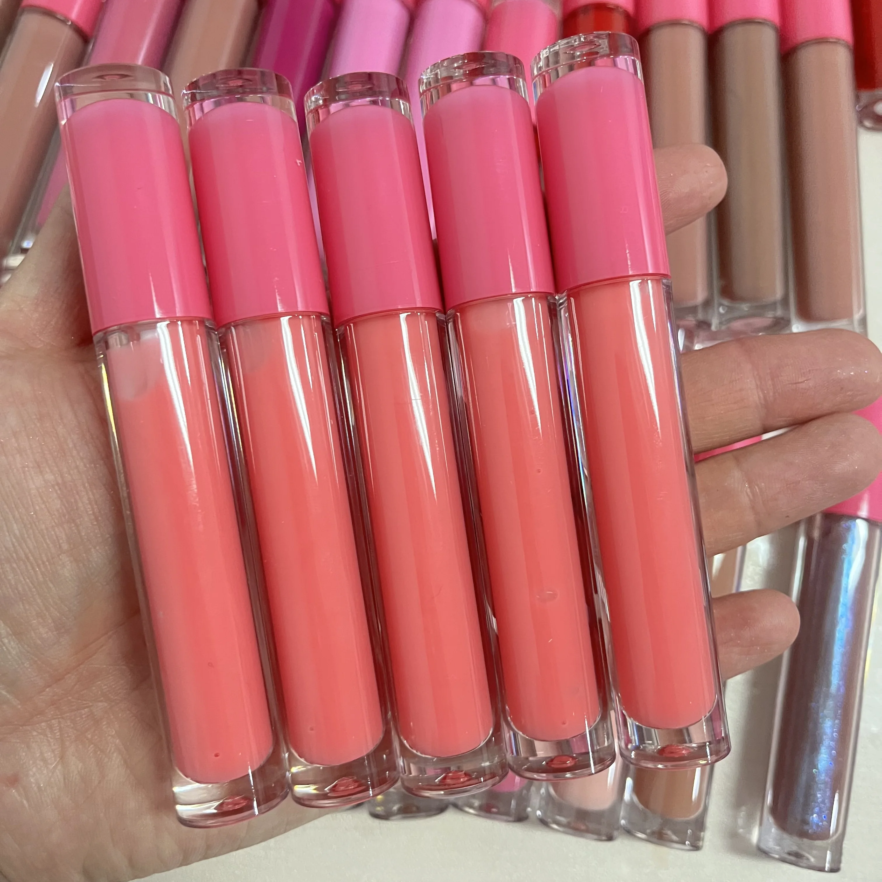 Lipgloss vendor wholesale private label  pink clear tube vegan lip gloss custom