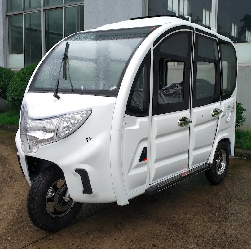 Electric 4-door passenger tricycle