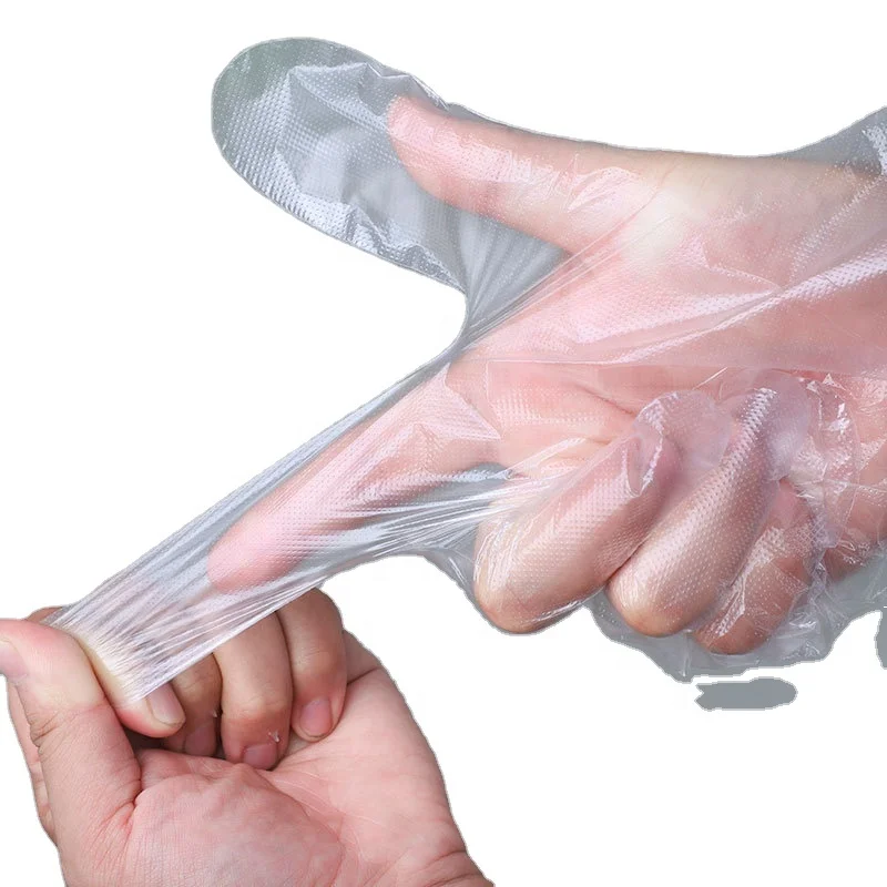 Available for export hanging perforated disposable gloves Plastic pe film transparent large size hot needle gloves manufacturers