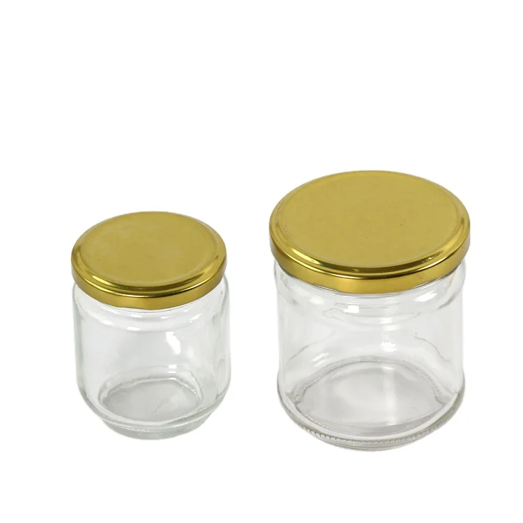 Factory wholesale transparent round airless glass honey storage bottle 100ml 150ml 200ml mint leaves storage empty bottle