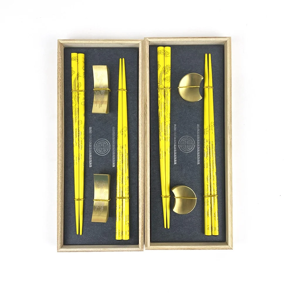 high-end golden dragon wood chopsticks with elegant golden moon stainless steel holders for restaurant