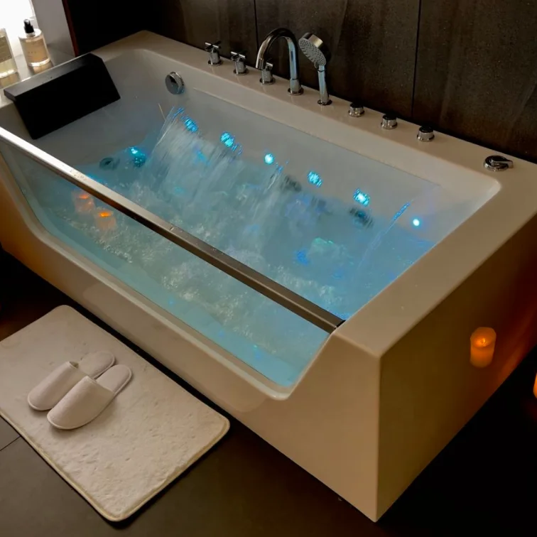 Cheap hotel rectangular acrylic Whirlpool bathtub adult freestanded corner Waterfall Spa massage tub for sale