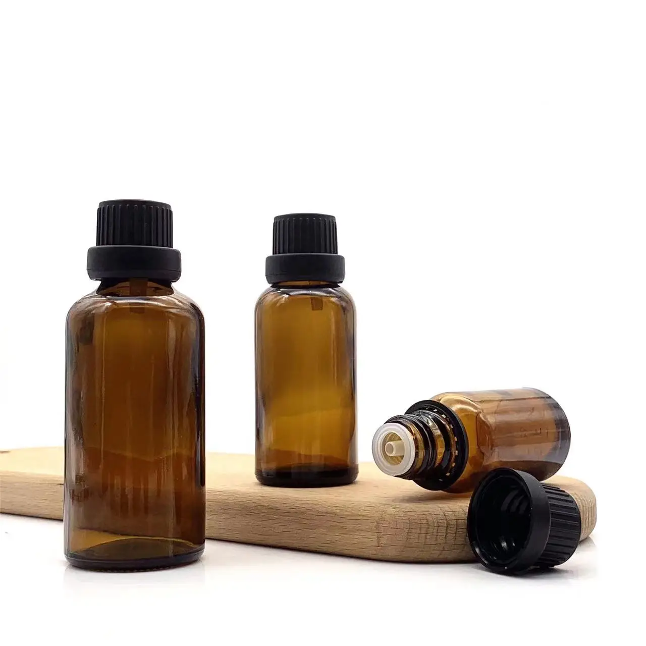 Essential Oil Dropper Bottle Tea Tree Essential Oil Clear Glass Dropper Bottle China Wholesale 1ML 2ML 3ML 5ML Cosmetic Amber