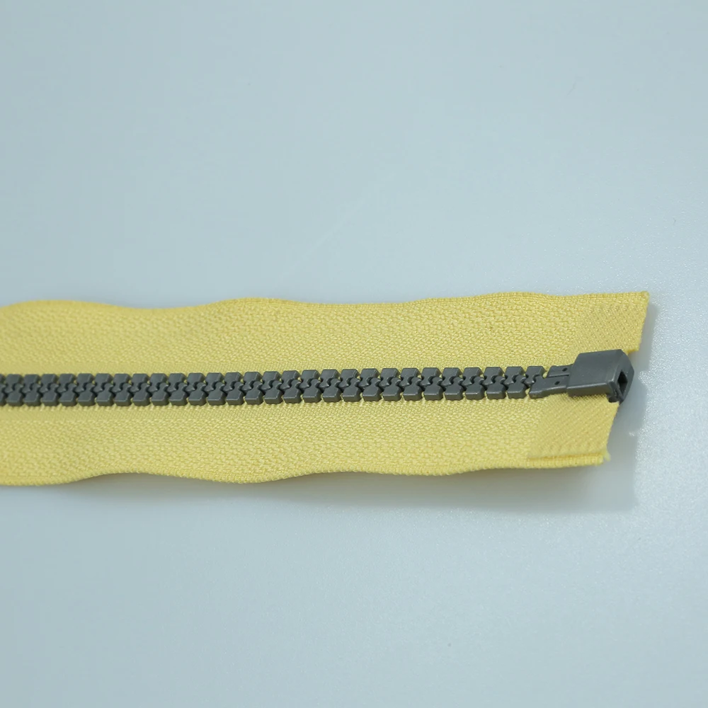 Decorative large plastic zipper open end separating zipper with yellow tape  for sale