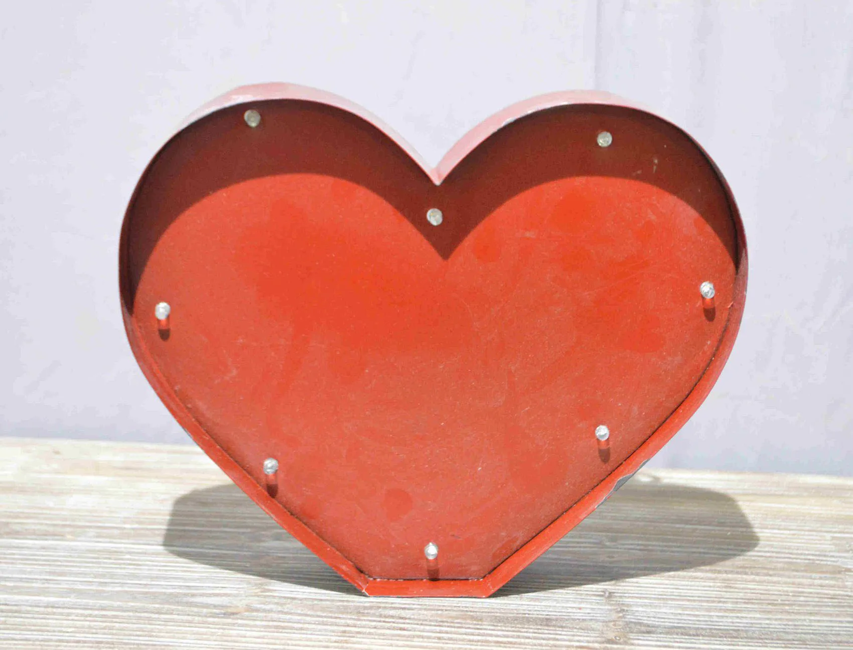 Decorative standing metal letters with lighted H letter