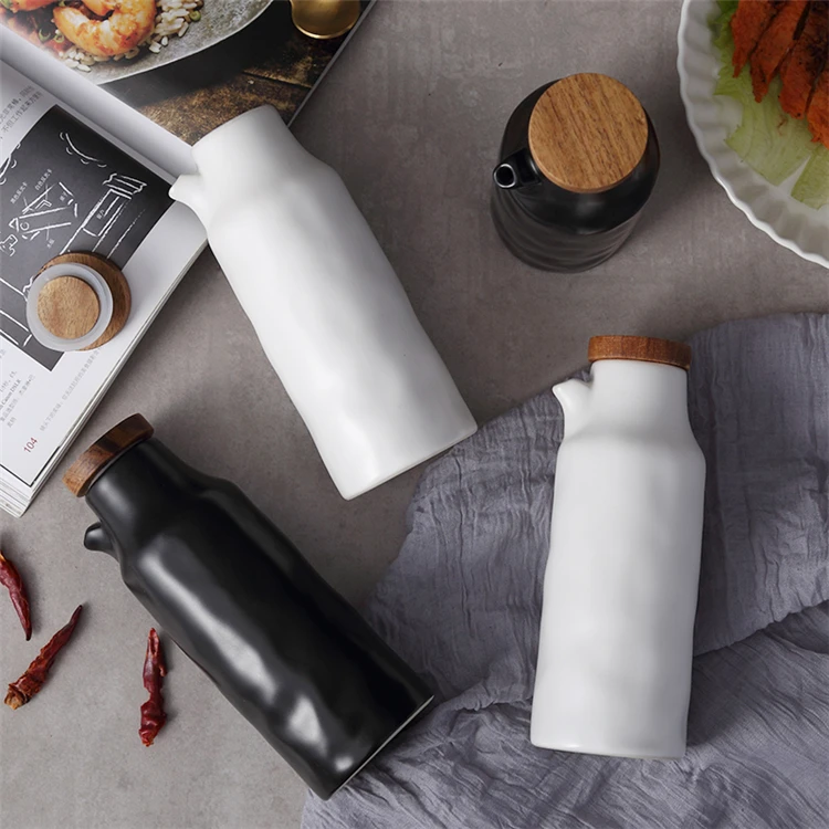 Popular design kitchen ware custom logo ceramic vinegar oil dispenser with bamboo lid