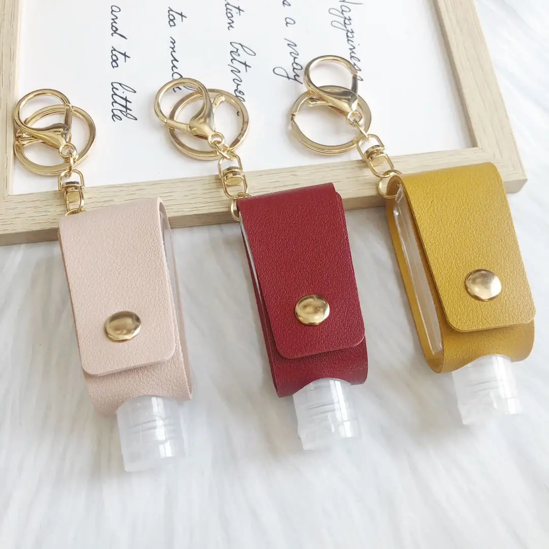 Xinxing New Empty sanitizer bottles  Keychain Holder Reusable Lotion Squeeze Tube Soap Containers Leather Pouches Accessories