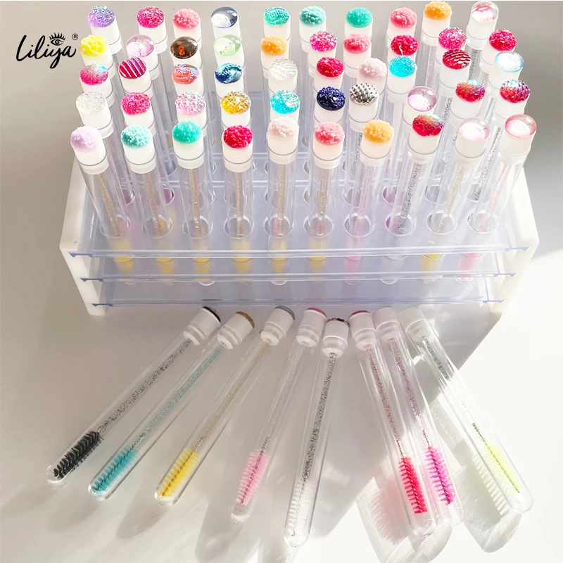 Wholesale OEM lash spoolie unique eyelash brush empty mascara tubes with brush keychain