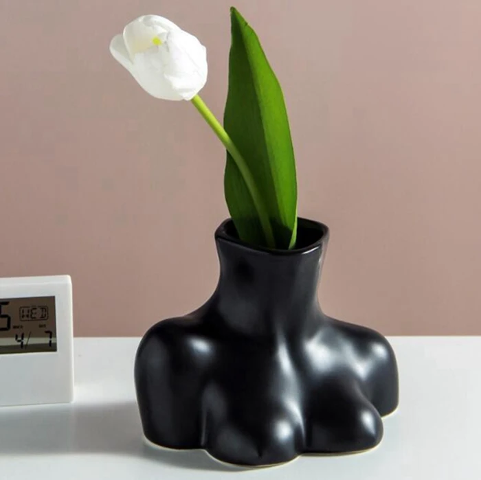 Nordic INS creative body vase, bust ceramic living room flower vase art home decoration .