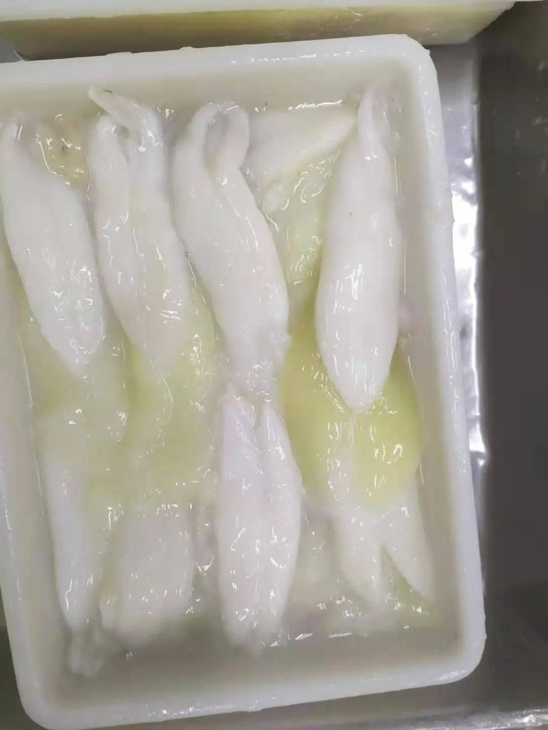 frozen squid roe organ in block