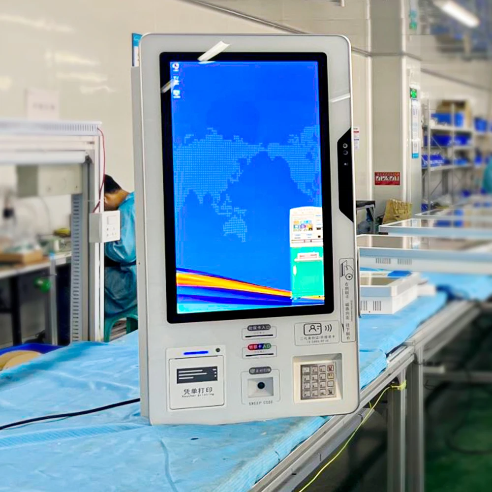 Wall-mounted self-service ticket collecting kiosk in cinema theater stadium