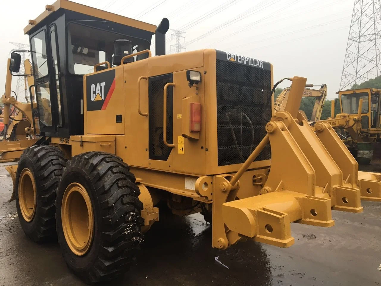Автогрейдер Caterpillar140H сделано в
