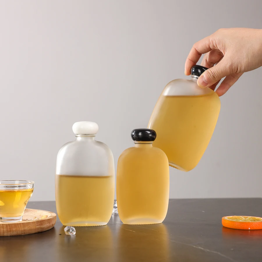 100 ml 200 ml Customized frosted empty cold brew coffee juice whisky glass bottles mini vodka glass bottles with screw cap