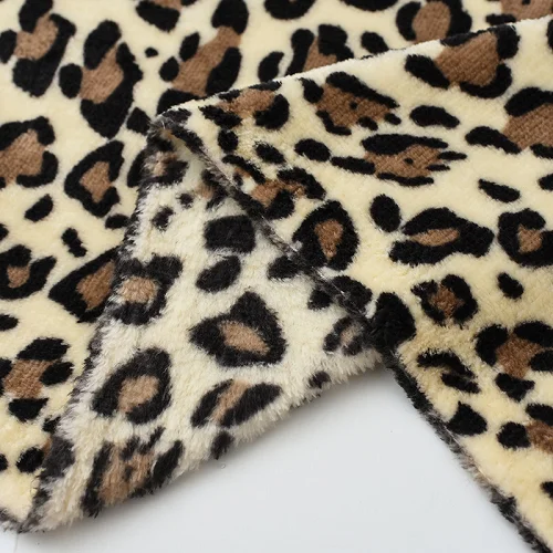 Hot Sale stock double-sided printed leopard leopard dot printed coral flannel fleece fabric for bathrobe pajamas