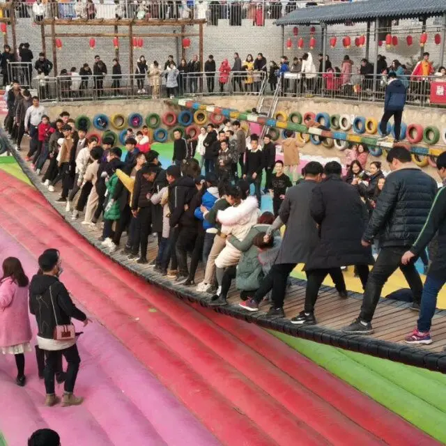 Support customized Swing bridge with a bouncer playground for younge people,water park entertainment equipment