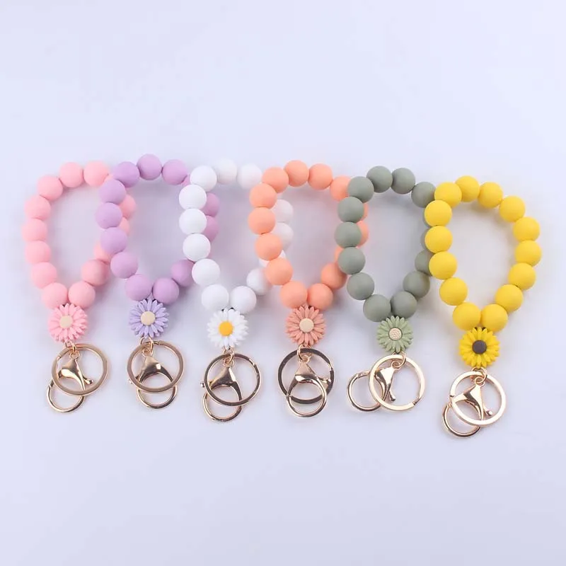 Factory Wholesale Creative Flower Charm Bracelet Solid Color Silicone Beads Wristlet Keychain for Women
