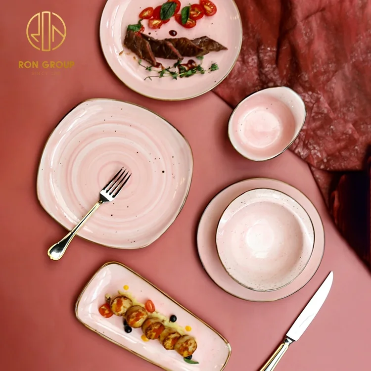 Hot selling customized hand drawing ceramic porcelain bowls and plates set with gold edge pink color dinnerware dishes plate